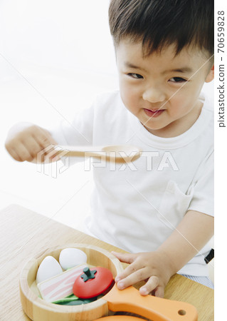Infants playing with toys Infants playing with toys 70659828