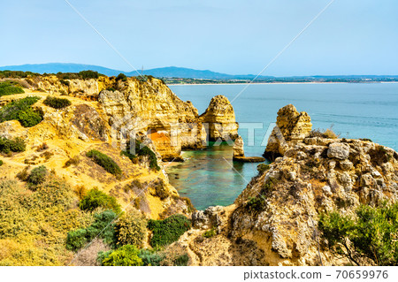Coastal cliffs at Ponta da Piedade in Lagos, Portugal Coastal cliffs at Ponta da Piedade in Lagos, Portugal 70659976