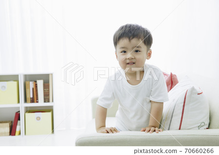 Children playing on the sofa 70660266
