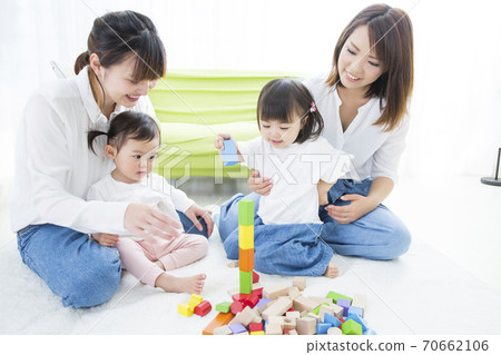 Parents and children playing 70662106