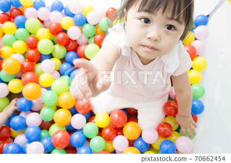 Infants playing in the ball pool Infants playing in the ball pool 70662454
