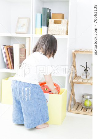 Infants playing with toys Infants playing with toys 70663138
