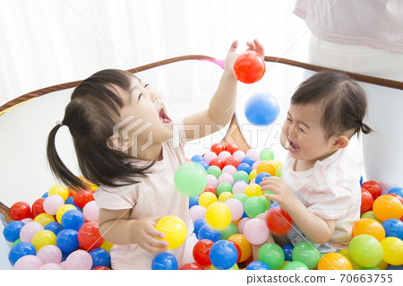Infants playing in the ball pool Infants playing in the ball pool 70663755