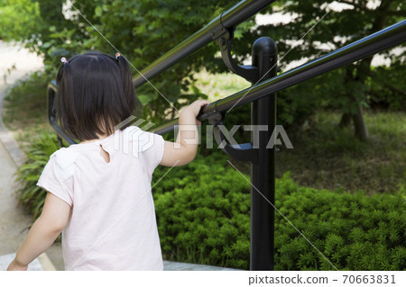 Girl playing outside 70663831