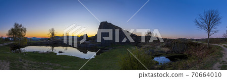 Polygonal structures of basalt columns, natural monument Panska skala near Kamenicky Senov, Czech Republic 70664010