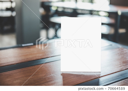 Mock up acrylic frame posters pattern template forms background, blank menu frame on table in coffee shop stand for your text of display your product Mock up acrylic frame posters pattern template forms background, blank menu frame on table in coffee shop stand for your text of display your product 70664589