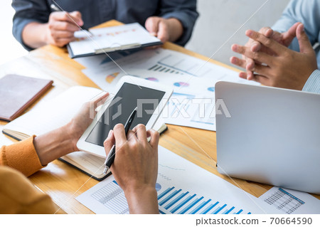 Business team meeting to conference, collaboration discussing working analyzing with financial data and marketing business strategy project, presentation and brainstorming to making profit of company 70664590