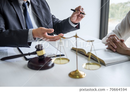 Good service cooperation, Consultation of Businesswoman and Male lawyer or judge counselor having team meeting with client, Law and Legal services concept 70664594