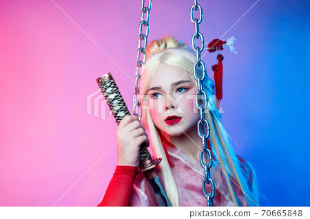 a woman in a geisha costume with a katana next to the chains a woman in a geisha costume with a katana next to the chains 70665848