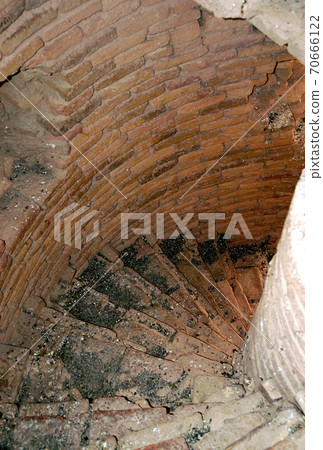 Minaret of Jam, Ghor Province in Afghanistan. The Jam minaret is a UNESCO site in a remote part of Central Afghanistan. The top of the Minaret of Jam showing the spiral staircase and inner brickwork. Minaret of Jam, Ghor Province in Afghanistan. The Jam minaret is a UNESCO site in a remote part of Central Afghanistan. The top of the Minaret of Jam showing the spiral staircase and inner brickwork. 70666122