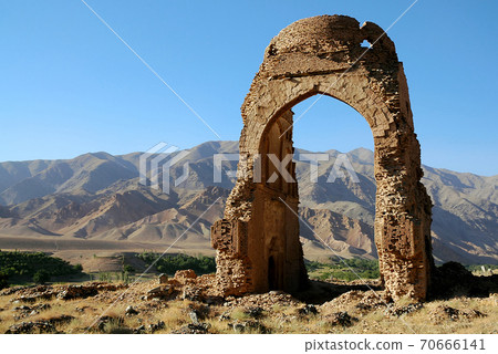 Chisht-e-Sharif, Herat Province, Afghanistan. One of two brick domes from the Ghorid period in Chisht e Sharif (or Chist e Sharif) in western Afghanistan. The monuments were built in the 12th century. 70666141