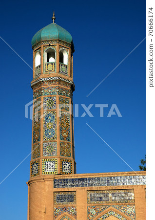 Herat in western Afghanistan. The Great Mosque of Herat (Friday Mosque or Jama Masjid). This is a small minaret on the corner of the mosque with tiling. This mosque is one of the oldest in Afghanistan 70666174