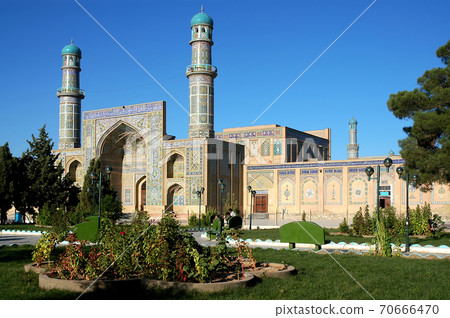 Herat in western Afghanistan. The Great Mosque of Herat (Friday Mosque or Jama Masjid). The mosque is decorated with mosaics and Quranic calligraphy. Friday Mosque and garden in Herat, Afghanistan. 70666470