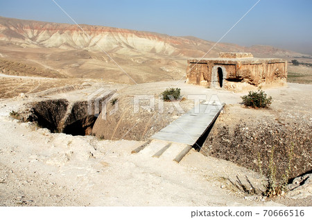 Takht-e Rostam (Takht-e Rustam) is a stupa monastery in northern Afghanistan. The stupa carved from rock surmounted by a harmika. Takht e Rostam is between Mazar i Sharif and Pol e Khomri, Afghanistan Takht-e Rostam (Takht-e Rustam) is a stupa monastery in northern Afghanistan. The stupa carved from rock surmounted by a harmika. Takht e Rostam is between Mazar i Sharif and Pol e Khomri, Afghanistan 70666516