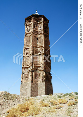 One of the two ancient minarets at Ghazni in Afghanistan. The Ghazni Minarets are elaborately decorated with geometric patterns. The monuments are a famous symbol of Ghazni in central Afghanistan. One of the two ancient minarets at Ghazni in Afghanistan. The Ghazni Minarets are elaborately decorated with geometric patterns. The monuments are a famous symbol of Ghazni in central Afghanistan. 70666520