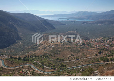 Archaelogical site of Delphi, Greece. Delphi is ancient sanctuary that grew rich as seat of oracle that was consulted on important decisions throughout ancient classical world. UNESCO World heritage Archaelogical site of Delphi, Greece. Delphi is ancient sanctuary that grew rich as seat of oracle that was consulted on important decisions throughout ancient classical world. UNESCO World heritage 70666687
