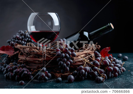 Red wine and grapes. Red wine and grapes. 70666866