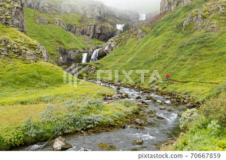Klifbrekkufossar falls in summer season view, Iceland. Klifbrekkufossar falls in summer season view, Iceland. 70667859