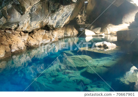 Grjotagja lava cave interior view, Iceland landmark Grjotagja lava cave interior view, Iceland landmark 70667901