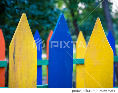 Multi Colored Wooden Fence background Multi Colored Wooden Fence background 70667964