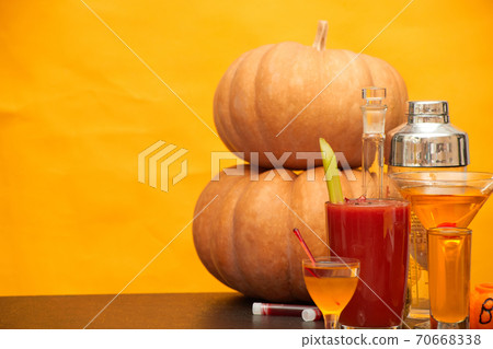 halloween bar cocktails party on orange background copy space halloween bar cocktails party on orange background copy space 70668338