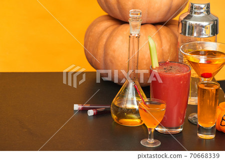 halloween bar cocktails party on orange background copy space halloween bar cocktails party on orange background copy space 70668339