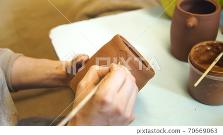Pottery master class in workshop. 70669063