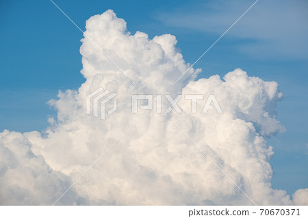 White clouds in rainy season. 70670371