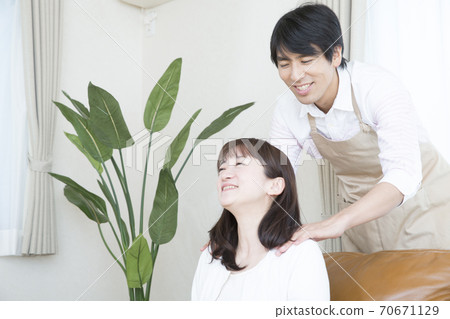 Husband rubbing shoulders Husband rubbing shoulders 70671129