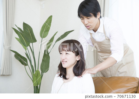 Husband rubbing shoulders Husband rubbing shoulders 70671130