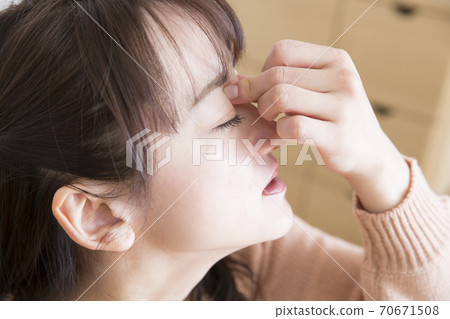 A woman with fatigue A woman with fatigue 70671508