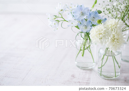 A pale flower background material that decorates the flowers A pale flower background material that decorates the flowers 70673324