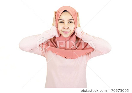 beautiful young muslim asian woman with traditional dress her hand covered her ear  isolated on white background 70675005