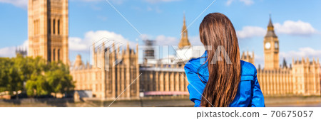 London Europe city travel woman panoramic banner looking at Westminster parliament, famous tourism attraction landmark. Autumn tourist people lifestyle. Background landscape panorama 70675057