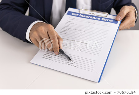 Insurance Agent Point Car Insurance Claim Form or Document for Sign Insurance Agent Point Car Insurance Claim Form or Document for Sign 70676184
