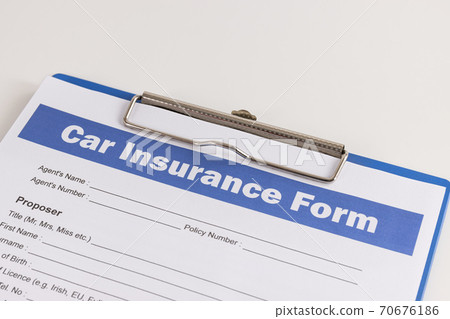 Car Insurance Claim Form or Insurance Document on Right Slant Car Insurance Claim Form or Insurance Document on Right Slant 70676186