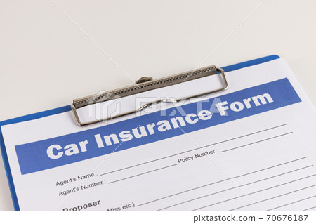 Car Insurance Claim Form or Insurance Document on Left Slant Car Insurance Claim Form or Insurance Document on Left Slant 70676187
