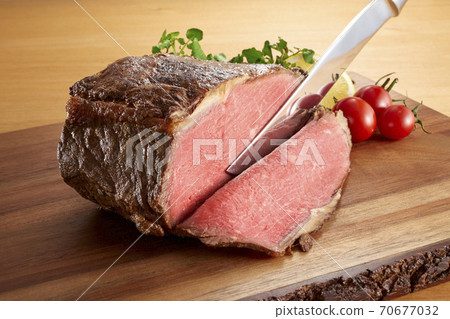 The finest roast beef baked to the extent that the contents remain slightly reddish The finest roast beef baked to the extent that the contents remain slightly reddish 70677032