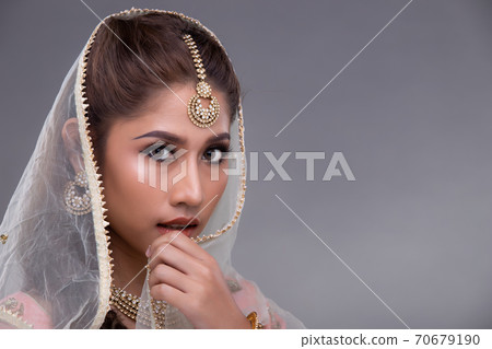 Indian beautiful bridal woman wear Traditional wedding dress costume Indian beautiful bridal woman wear Traditional wedding dress costume 70679190