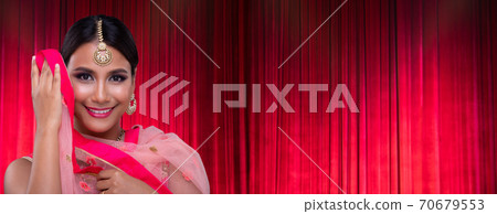 Indian beautiful bridal woman wear Traditional wedding dress costume Indian beautiful bridal woman wear Traditional wedding dress costume 70679553