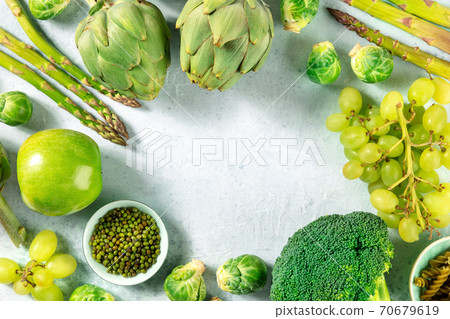 Green vegan food banner, a design template for a spring or summer menu with a place for text, a flat lay 70679619