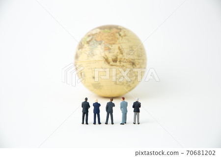 A globe and a businessman 70681202