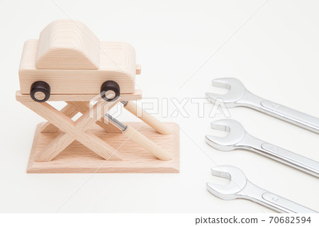 Car maintenance (car, car lift and wrench) 70682594