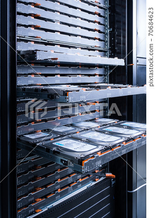 close up of hard disk drives inside hosting center 70684623