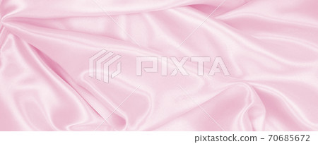 Smooth elegant pink silk or satin texture as wedding background. Luxurious background design Smooth elegant pink silk or satin texture as wedding background. Luxurious background design 70685672