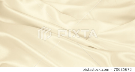 Smooth elegant golden silk or satin luxury cloth texture as wedding background. Luxurious background design. In Sepia toned. Retro style Smooth elegant golden silk or satin luxury cloth texture as wedding background. Luxurious background design. In Sepia toned. Retro style 70685673