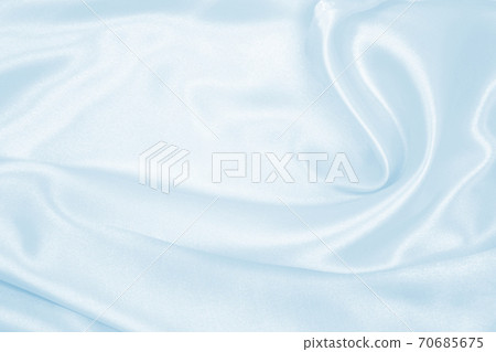 Smooth elegant blue silk or satin luxury cloth texture as abstract background. Luxurious background design Smooth elegant blue silk or satin luxury cloth texture as abstract background. Luxurious background design 70685675