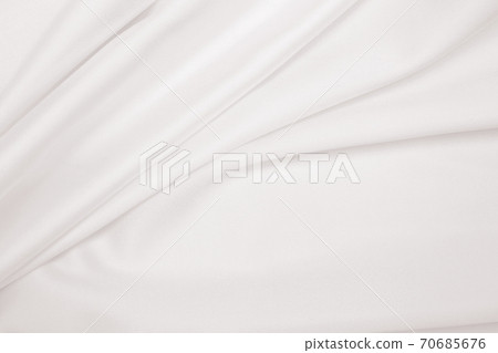 Smooth elegant golden silk or satin luxury cloth texture as wedding background. Luxurious background design. In Sepia toned. Retro style Smooth elegant golden silk or satin luxury cloth texture as wedding background. Luxurious background design. In Sepia toned. Retro style 70685676