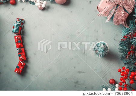 Christmas festive green background with toy train 70688904