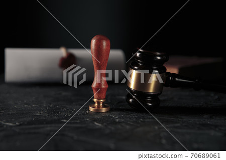 Notary's public pen and stamp on testament and last will. Notary public tools Notary's public pen and stamp on testament and last will. Notary public tools 70689061